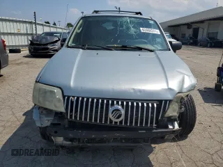 2005 Mercury Mariner Luxury z VIN 4M2YU57155DJ28005, wystawiony jako Copart lot #63460344 z przebiegiem 131 531 mil mil oraz Szkody całkowita. Historia ofert i sprzedaży dostępna na DreamBid. Obrazek 5.