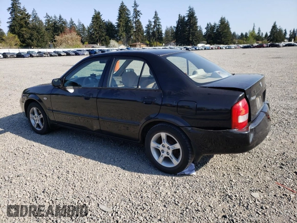 2003 Mazda Protege DX with VIN JM1BJ226231214537, listed as a Copart auction lot 54448615 with 147,753 mi miles and Salvage Title. Bid and sale history available at DreamBid. Image 2.