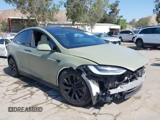 2022 Tesla Model X Plaid with VIN 7SAXCBE66NF352882, listed as a IAAI auction lot 39751976 with Not Provided miles and . Bid and sale history available at DreamBid. Image 1.