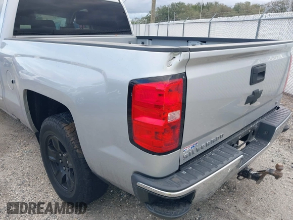 2018 Chevrolet Silverado 1500 LT with VIN 1GCRCREC5JZ138622, listed as a IAAI auction lot 41631828 with Not Provided miles and . Bid and sale history available at DreamBid. Image 6.