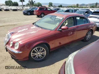 2003 Jaguar S-Type z VIN SAJEA01U13HM90556, wystawiony jako Copart lot #59578535 z przebiegiem 50 723 mil mil oraz Czysty tytuł • Clean title. Historia ofert i sprzedaży dostępna na DreamBid. Obrazek 1.