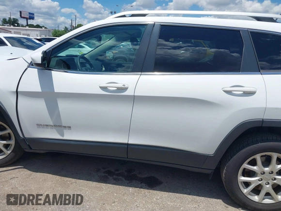 2018 Jeep Cherokee Latitude with VIN 1C4PJLCX3JD551801, listed as a IAAI auction lot 42226643 with 89,246 mi miles and . Bid and sale history available at DreamBid. Image 14.