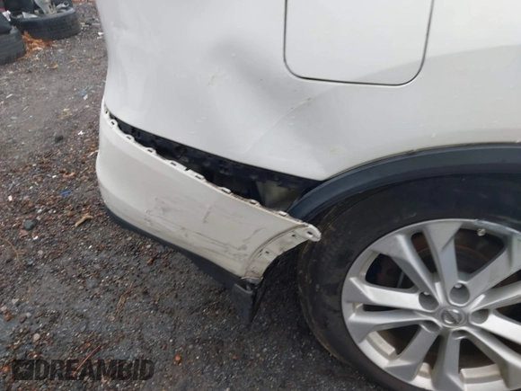 2014 Nissan Rogue SV with VIN 5N1AT2MT2EC774134, listed as a IAAI auction lot 41556875 with 127,630 mi miles and . Bid and sale history available at DreamBid. Image 14.