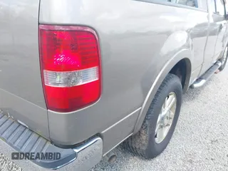 2004 Ford F-150 XL with VIN 1FTPX12584NA58780, listed as a IAAI auction lot 42123687 with 160,672 mi miles. Bid and sale history available at carsss.com. Image 14.