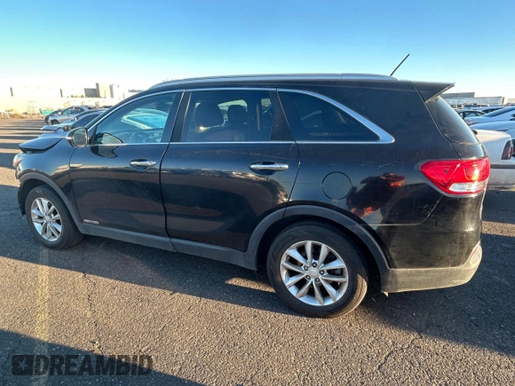 2016 Kia Sorento LX with VIN 5XYPGDA55GG137273, listed as a Copart auction lot 87420554 with 131,056 mi miles and Salvage Title. Bid and sale history available at carsss.com. Image 2.
