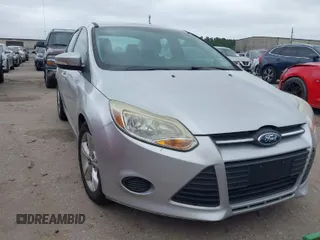 2014 Ford Focus SE with VIN 1FADP3F21EL354774, listed as a IAAI auction lot 41972701 with 115,046 mi miles. Bid and sale history available at carsss.com. Image 1.