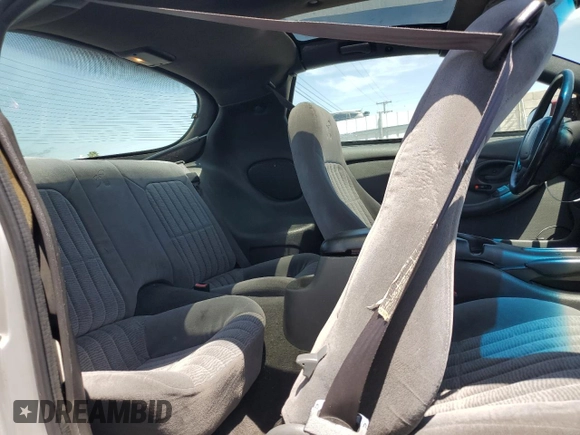 2000 Pontiac Firebird Firebird z VIN 2G2FS22K5Y2116047, wystawiony jako Copart lot #58234695 z przebiegiem 155 876 mil mil oraz Czysty tytuł • Clean title. Historia ofert i sprzedaży dostępna na DreamBid. Obrazek 10.