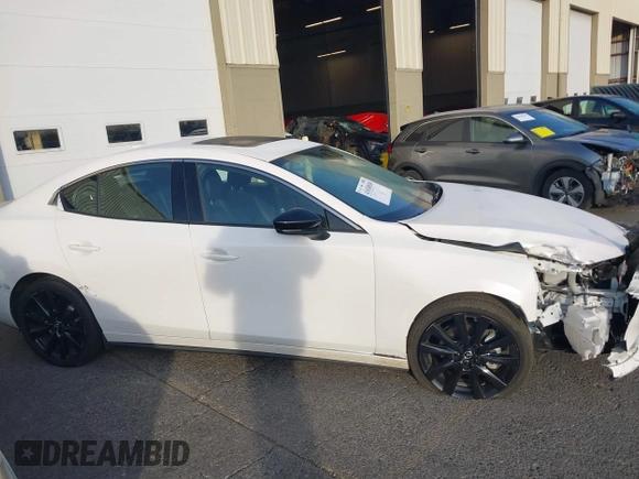 2022 Mazda 3 2.5 Turbo with VIN 3MZBPBAY2NM311824, listed as a IAAI auction lot 41038030 with 21,669 mi miles and . Bid and sale history available at DreamBid. Image 14.