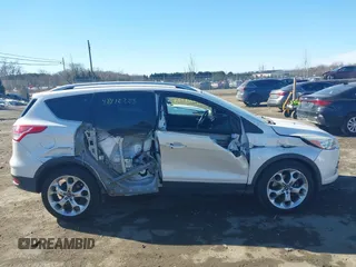 2016 Ford Escape Titanium with VIN 1FMCU9J96GUB65441, listed as a IAAI auction lot 41412223 with 74,218 mi miles. Bid and sale history available at carsss.com. Image 13.