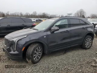 2022 Cadillac XT4 AWD Sport с VIN 1GYFZFR46NF109148, выставлен на аукционе Copart как лот 37130244 с пробегом 23 223 миль миль и . История ставок и продаж доступна на DreamBid. Изображение 1.
