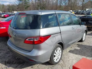 2012 Mazda 5 Sport with VIN JM1CW2BLXC0101310, listed as a IAAI auction lot 41207247 with 146,691 mi miles. Bid and sale history available at carsss.com. Image 4.