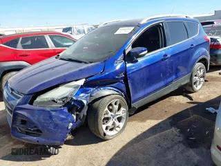 2016 Ford Escape Titanium with VIN 1FMCU0J95GUC41632, listed as a IAAI auction lot 41692040 with 144,834 mi miles. Bid and sale history available at carsss.com. Image 17.