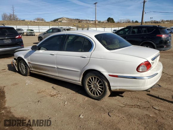 2007 Jaguar X-Type z VIN SAJWA51A07WJ14424, wystawiony jako Copart lot #84556864 z przebiegiem Nie podano mil oraz Szkody całkowita. Historia ofert i sprzedaży dostępna na DreamBid. Obrazek 2.