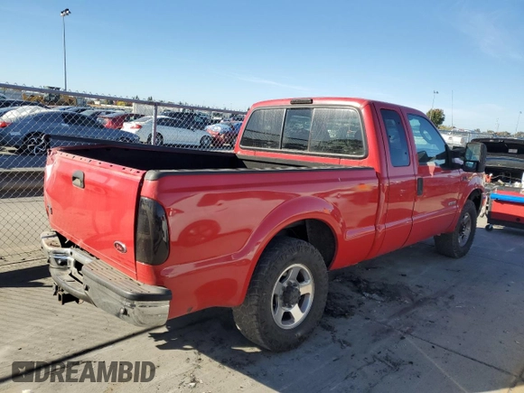 2004 Ford F-250 XL with VIN 1FTNX20P04EB98825, listed as a Copart auction lot 79729074 with 176,099 mi miles and Salvage title. Bid and sale history available at DreamBid. Image 3.