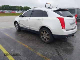 2012 Cadillac SRX Performance Collection with VIN 3GYFNEE33CS528697, listed as a IAAI auction lot 41374060 with 157,319 mi miles and . Bid and sale history available at DreamBid. Image 3.