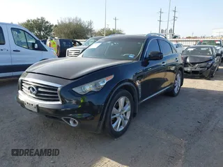 2014 Infiniti QX70 with VIN JN8CS1MU5EM450712, listed as a IAAI auction lot 41734354 with 164,349 mi miles and . Bid and sale history available at DreamBid. Image 17.
