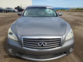 2011 Infiniti M with VIN JN1BY1ARXBM370844, listed as a Copart auction lot 62425515 with 277,315 mi miles and Salvage title. Bid and sale history available at DreamBid. Image 5.