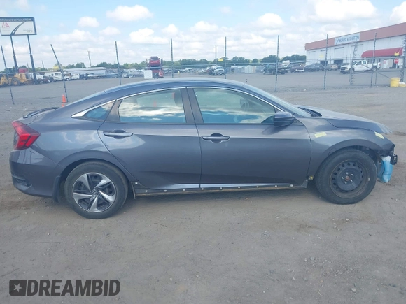 2020 Honda Civic LX with VIN 2HGFC2F65LH505932, listed as a IAAI auction lot 40046863 with 59,768 mi miles and . Bid and sale history available at DreamBid. Image 14.