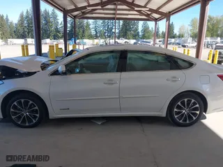 2016 Toyota Avalon Hybrid XLE Premium with VIN 4T1BD1EB2GU048496, listed as a IAAI auction lot 42047633 with 68,900 mi miles. Bid and sale history available at carsss.com. Image 14.
