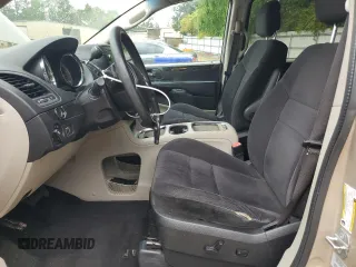 2015 Dodge Grand Caravan SXT with VIN 2C4RDGCG7FR536049, listed as a Copart auction lot 55963115 with 141,228 mi miles and Clean Title. Bid and sale history available at DreamBid. Image 7.