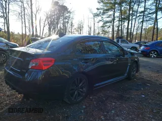 2016 Subaru WRX Limited with VIN JF1VA1N66G8827010, listed as a IAAI auction lot 41074219 with 69,919 mi miles. Bid and sale history available at carsss.com. Image 4.