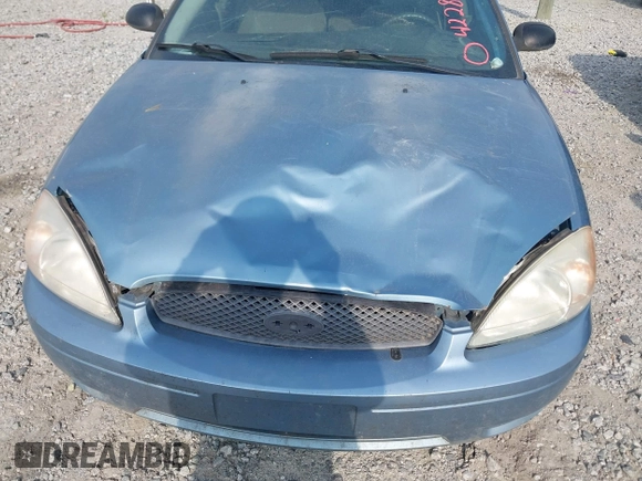 2006 Ford Taurus SE z VIN 1FAFP53U96A241825, wystawiony jako IAAI lot #42286654 z przebiegiem 205 136 mil mil oraz . Historia ofert i sprzedaży dostępna na DreamBid. Obrazek 6.