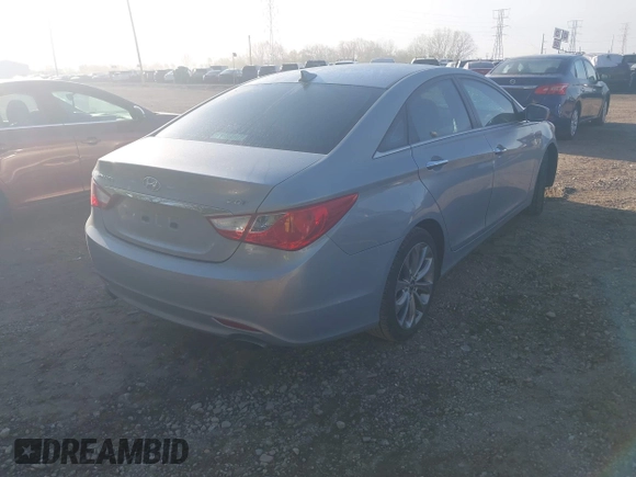 2012 Hyundai Sonata SE with VIN 5NPEC4AB7CH330570, listed as a IAAI auction lot 42108128 with 124,439 mi miles and . Bid and sale history available at carsss.com. Image 4.