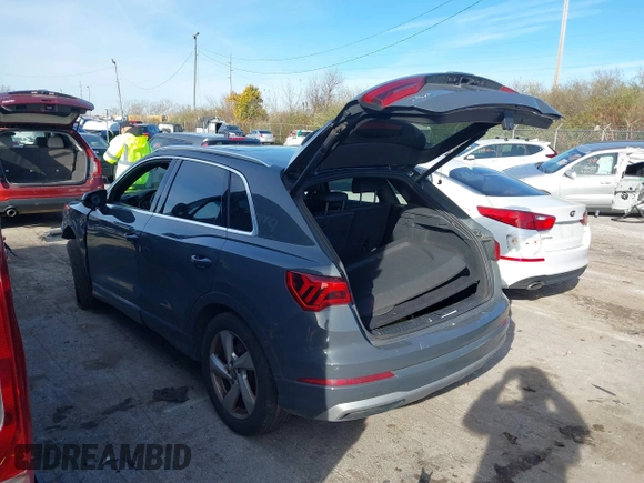 2019 Audi Q3 Premium with VIN WA1AECF34K1077065, listed as a IAAI auction lot 40826923 with 85,458 mi miles and . Bid and sale history available at DreamBid. Image 3.