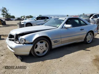 1998 Mercedes-Benz SL 500 with VIN WDBFA67F0WF162848, listed as a Copart auction lot 61236945 with 115,920 mi miles and Salvage title. Bid and sale history available at DreamBid. Image 1.