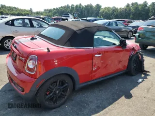 2013 MINI Roadster S z VIN WMWSY3C58DT594039, wystawiony jako Copart lot #65833804 z przebiegiem Nie podano mil oraz Szkody całkowita. Historia ofert i sprzedaży dostępna na DreamBid. Obrazek 3.