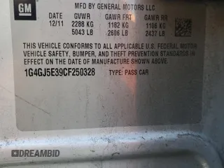 2012 Buick LaCrosse Touring with VIN 1G4GJ5E39CF250328, listed as a Copart auction lot 56873415 with 118,664 mi miles and Salvage title. Bid and sale history available at DreamBid. Image 12.