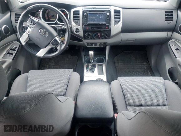 2015 Toyota Tacoma with VIN 3TMLU4EN6FM203591, listed as a Copart auction lot 58518185 with 149,729 mi miles and Salvage title. Bid and sale history available at DreamBid. Image 8.
