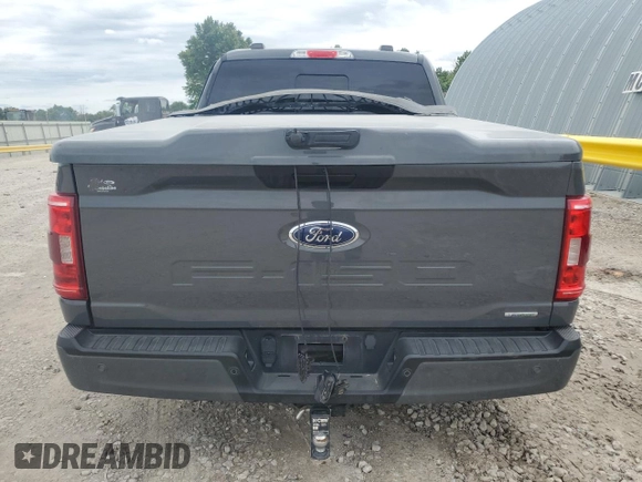 2021 Ford F-150 XL z VIN 1FTEW1EPXMFA72777, wystawiony jako Copart lot #58859095 z przebiegiem Nie podano mil oraz Szkoda całkowita • Salvage title. Historia ofert i sprzedaży dostępna na DreamBid. Obrazek 6.
