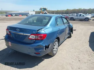 2013 Toyota Corolla L with VIN 5YFBU4EE5DP148083, listed as a IAAI auction lot 42105492 with 73,274 mi miles and . Bid and sale history available at carsss.com. Image 4.