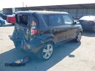 2011 Kia Soul + with VIN KNDJT2A28B7292286, listed as a IAAI auction lot 41999479 with 100,693 mi miles. Bid and sale history available at carsss.com. Image 4.
