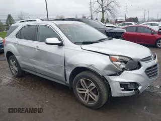 2016 Chevrolet Equinox LTZ z VIN 2GNALDEK0G1111621, wystawiony jako IAAI lot #40911755 z przebiegiem 215 938 mil mil oraz . Historia ofert i sprzedaży dostępna na DreamBid. Obrazek 1.