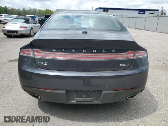 2013 Lincoln MKZ z VIN 3LN6L2G98DR820605, wystawiony jako Copart lot #57413995 z przebiegiem 248 752 mil mil oraz Czysty tytuł • Clean title. Historia ofert i sprzedaży dostępna na DreamBid. Obrazek 6.