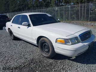 1999 Ford Crown Victoria LX with VIN 2FAFP74W7XX185341, listed as a IAAI auction lot 42020186 with 178,997 mi miles. Bid and sale history available at carsss.com. Image 1.