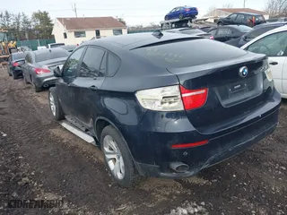 2011 BMW X6 35i with VIN 5UXFG2C58BLX08487, listed as a IAAI auction lot 41627394 with 999,999 mi miles. Bid and sale history available at carsss.com. Image 3.