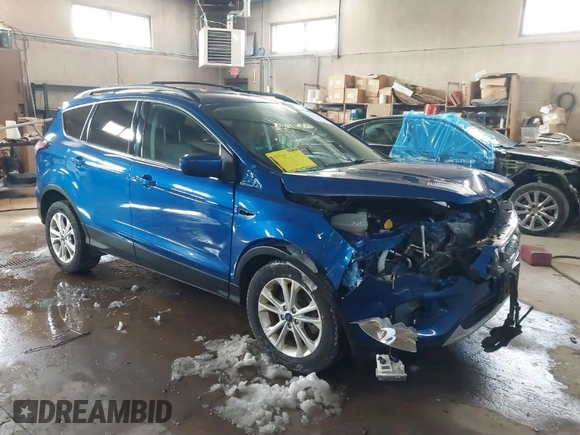 2018 Ford Escape SE z VIN 1FMCU9GD1JUB80500, wystawiony jako IAAI lot #41613294 z przebiegiem 112 187 mil mil oraz . Historia ofert i sprzedaży dostępna na DreamBid. Obrazek 1.