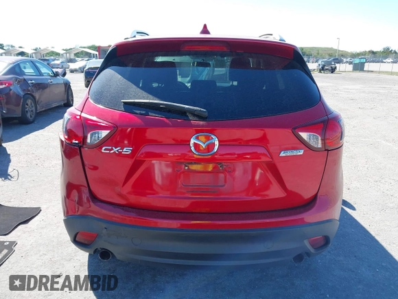 2015 Mazda CX-5 Touring with VIN JM3KE2CY5F0542184, listed as a IAAI auction lot 41770264 with 119,592 mi miles. Bid and sale history available at carsss.com. Image 16.