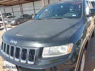 2014 Jeep Grand Cherokee Laredo with VIN 1C4RJEAG1EC348070, listed as a IAAI auction lot 41950898 with 129,883 mi miles. Bid and sale history available at carsss.com. Image 10.