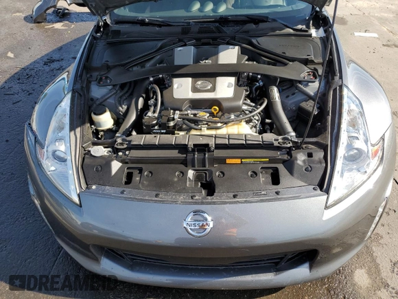 2015 Nissan 370Z with VIN JN1AZ4EH2FM444159, listed as a Copart auction lot 71005944 with 54,063 mi miles and Salvage Title. Bid and sale history available at carsss.com. Image 11.