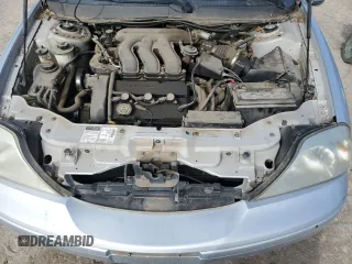 2000 Mercury Sable LS Premium z VIN 1MEFM55S2YG615740, wystawiony jako Copart lot #51266595 z przebiegiem 143 060 mil mil oraz Szkody całkowita. Historia ofert i sprzedaży dostępna na DreamBid. Obrazek 13.