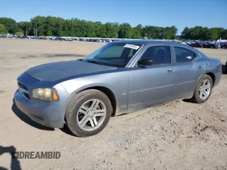 2006 Dodge Charger z VIN 2B3KA43G26H227945, wystawiony jako Copart lot #55734805 z przebiegiem 153 441 mil mil oraz Czysty tytuł • Clean title. Historia ofert i sprzedaży dostępna na DreamBid. Obrazek 1.