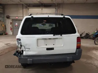 1997 Jeep Grand Cherokee Laredo z VIN 1J4GZ58S9VC562907, wystawiony jako IAAI lot #42102313 z przebiegiem 137 672 mil mil oraz . Historia ofert i sprzedaży dostępna na DreamBid. Obrazek 16.