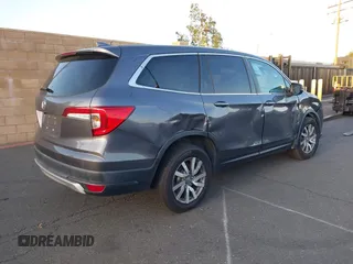 2021 Honda Pilot EX-L with VIN 5FNYF5H54MB018846, listed as a IAAI auction lot 41208987 with 80,757 mi miles and . Bid and sale history available at DreamBid. Image 4.