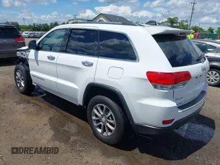 2014 Jeep Grand Cherokee Limited with VIN 1C4RJFBG3EC350648, listed as a IAAI auction lot 42523221 with 125,447 mi miles and . Bid and sale history available at DreamBid. Image 3.