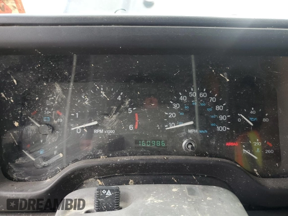1999 Jeep Wrangler SE z VIN 1J4FY29P0XP479580, wystawiony jako Copart lot #63075455 z przebiegiem 160 986 mil mil oraz Szkoda całkowita • Salvage title. Historia ofert i sprzedaży dostępna na DreamBid. Obrazek 9.