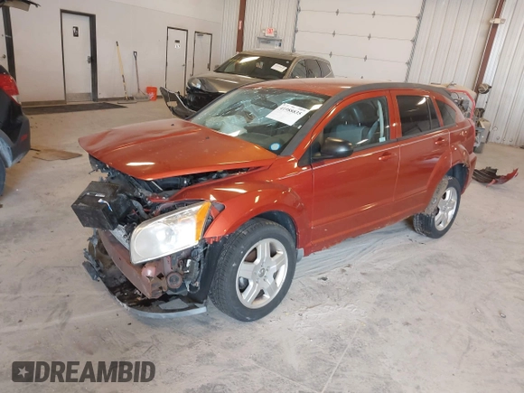 2009 Dodge Caliber SXT with VIN 1B3HB48A59D168273, listed as a IAAI auction lot 41988835 with 200,125 mi miles and . Bid and sale history available at DreamBid. Image 2.